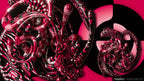 Abstract digital artwork featuring glossy, swirling red, pink, black, and white organic forms on a black background, with a visible 'neeko release kit' label in the bottom right corner.